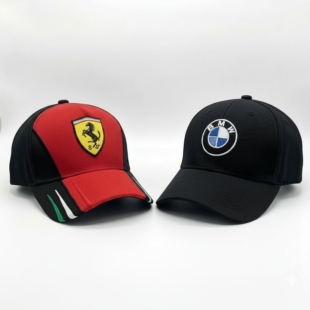 Two baseball caps with Ferrari and Mercedes-Benz logos on a white background