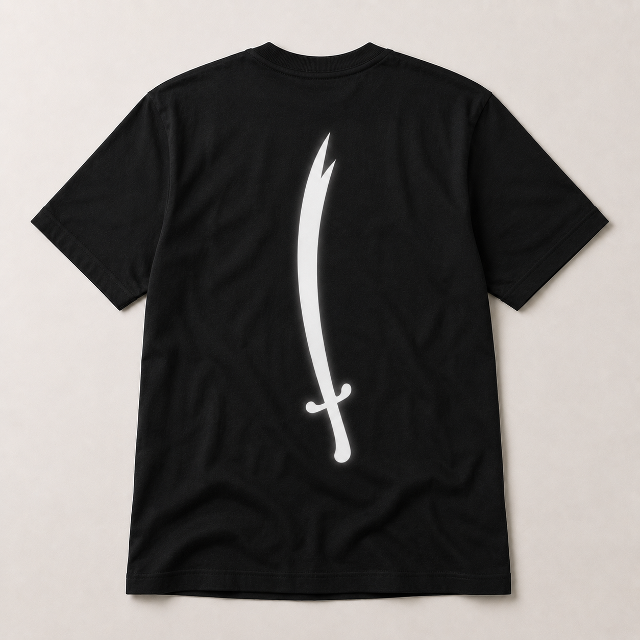 Black t-shirt with a white sword design on a beige background